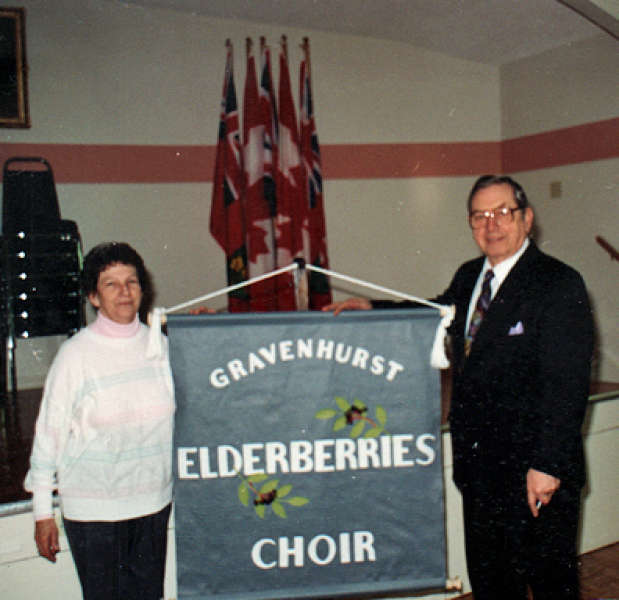 Fern and Mike Lipiski with the Elderberries Banner