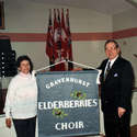Fern and Mike Lipiski with the Elderberries Banner