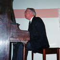 Dr, Boughen at the piano